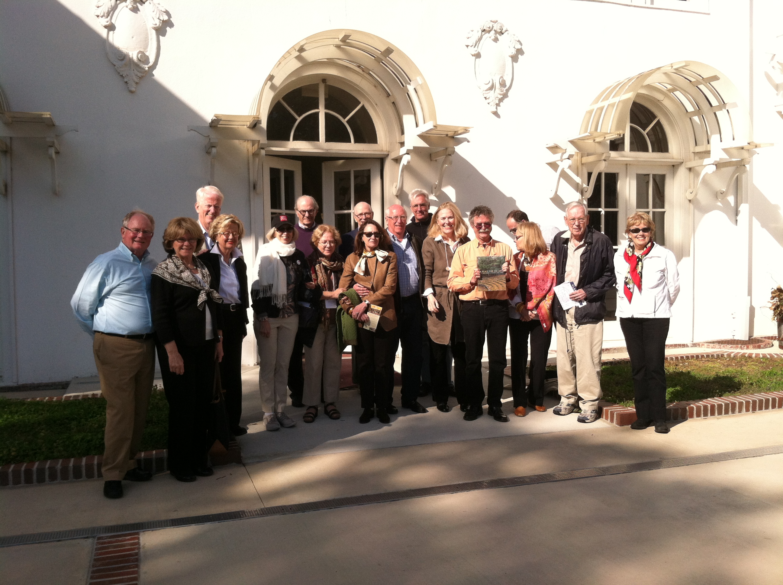 Photo:  Participants is the recent MacDowell colony Delta tour in front of the Cutrer Mansion in Clarksdale.  Dr. Luther Brown, who led the tour, is holding a book about the Colony and its history.  